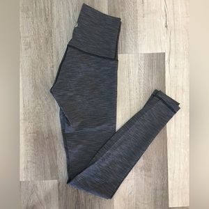 Grey with black seam 7/8 lululemon leggings.